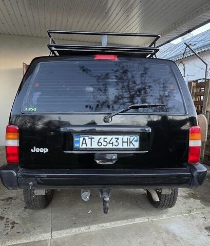 Черный Джип Чероки, объемом двигателя 2.5 л и пробегом 230 тыс. км за 5700 $, фото 4 на Automoto.ua