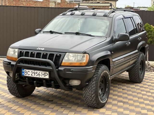 Чорний Джип Cherokee, об'ємом двигуна 0.32 л та пробігом 150 тис. км за 6999 $, фото 2 на Automoto.ua