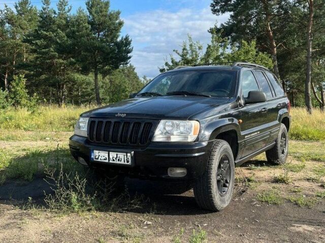 Черный Джип Чероки, объемом двигателя 4.7 л и пробегом 270 тыс. км за 3000 $, фото 1 на Automoto.ua