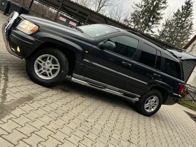 Черный Джип Чероки, объемом двигателя 3.1 л и пробегом 250 тыс. км за 3123 $, фото 1 на Automoto.ua