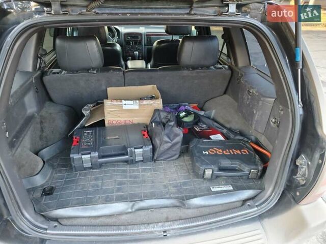 Черный Джип Чероки, объемом двигателя 4.7 л и пробегом 365 тыс. км за 6999 $, фото 7 на Automoto.ua