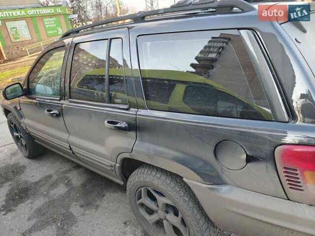 Черный Джип Чероки, объемом двигателя 4.7 л и пробегом 365 тыс. км за 6999 $, фото 2 на Automoto.ua