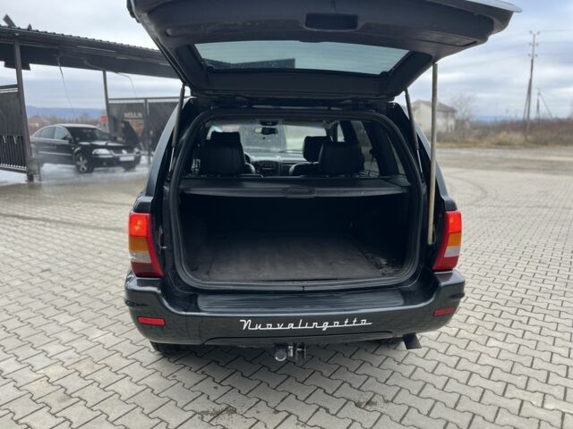 Черный Джип Чероки, объемом двигателя 3.1 л и пробегом 250 тыс. км за 3123 $, фото 3 на Automoto.ua