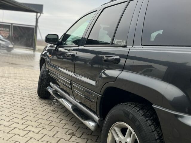 Черный Джип Чероки, объемом двигателя 3.1 л и пробегом 250 тыс. км за 3123 $, фото 2 на Automoto.ua