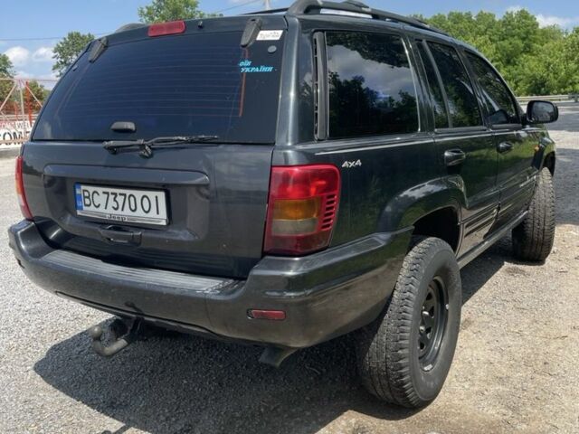 Черный Джип Чероки, объемом двигателя 3.1 л и пробегом 339 тыс. км за 7000 $, фото 3 на Automoto.ua