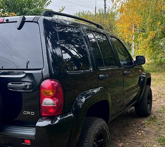 Чорний Джип Cherokee, об'ємом двигуна 2.5 л та пробігом 185 тис. км за 7500 $, фото 2 на Automoto.ua