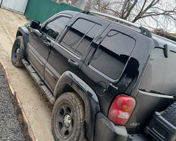 Чорний Джип Cherokee, об'ємом двигуна 2.8 л та пробігом 266 тис. км за 9500 $, фото 1 на Automoto.ua