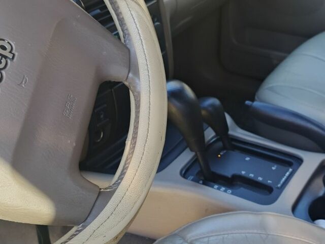 Черный Джип Чероки, объемом двигателя 2.7 л и пробегом 250 тыс. км за 7500 $, фото 7 на Automoto.ua