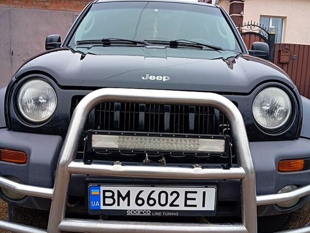 Черный Джип Чероки, объемом двигателя 2.4 л и пробегом 284 тыс. км за 6200 $, фото 1 на Automoto.ua