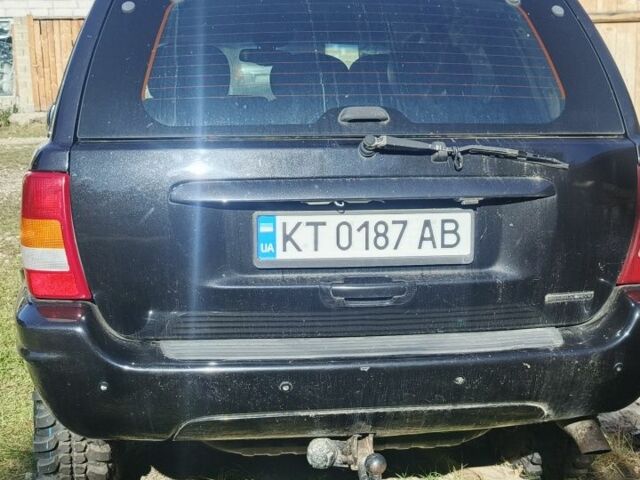 Черный Джип Чероки, объемом двигателя 2.7 л и пробегом 250 тыс. км за 7500 $, фото 4 на Automoto.ua