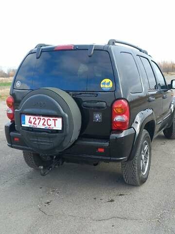 Черный Джип Чероки, объемом двигателя 2.8 л и пробегом 145 тыс. км за 5500 $, фото 4 на Automoto.ua