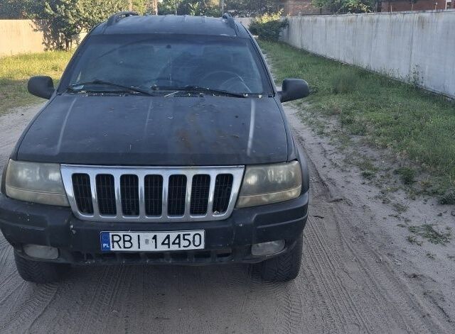 Черный Джип Чероки, объемом двигателя 3 л и пробегом 220 тыс. км за 1700 $, фото 1 на Automoto.ua