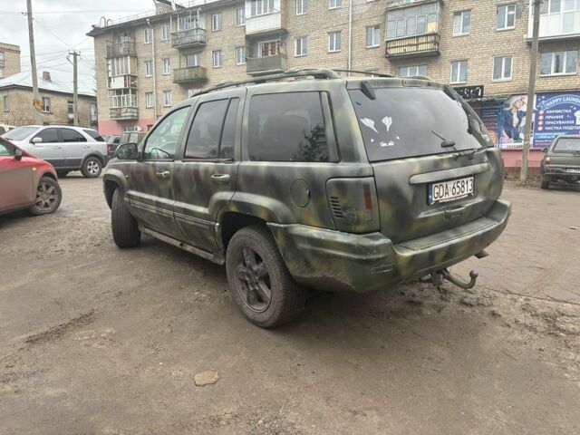 Чорний Джип Cherokee, об'ємом двигуна 3 л та пробігом 300 тис. км за 4251 $, фото 2 на Automoto.ua