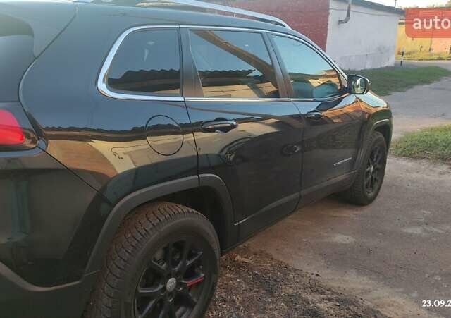 Чорний Джип Cherokee, об'ємом двигуна 2.4 л та пробігом 78 тис. км за 13700 $, фото 1 на Automoto.ua