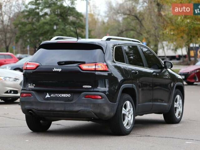 Джип Cherokee 2014 у Києві на Automoto.ua Чорний Джип Cherokee, об'ємом двигуна 2.36 л та пробігом 144 тис. км за 12900 $, фото 3 на Automoto.ua