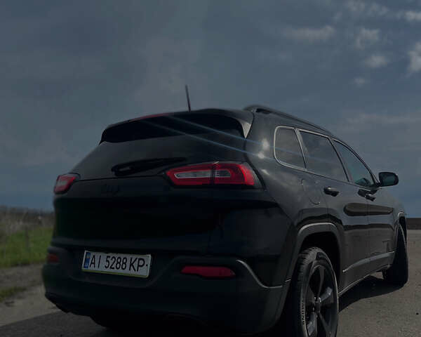 Чорний Джип Cherokee, об'ємом двигуна 2.4 л та пробігом 157 тис. км за 14000 $, фото 4 на Automoto.ua