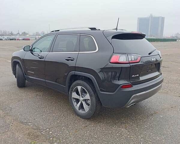 Чорний Джип Cherokee, об'ємом двигуна 2 л та пробігом 93 тис. км за 17300 $, фото 2 на Automoto.ua