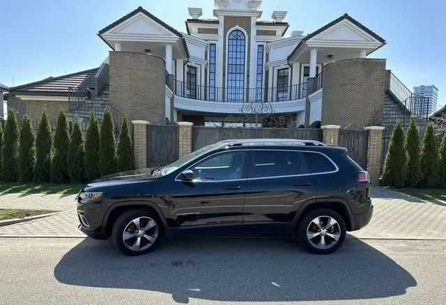 Чорний Джип Cherokee, об'ємом двигуна 2.4 л та пробігом 95 тис. км за 13000 $, фото 2 на Automoto.ua