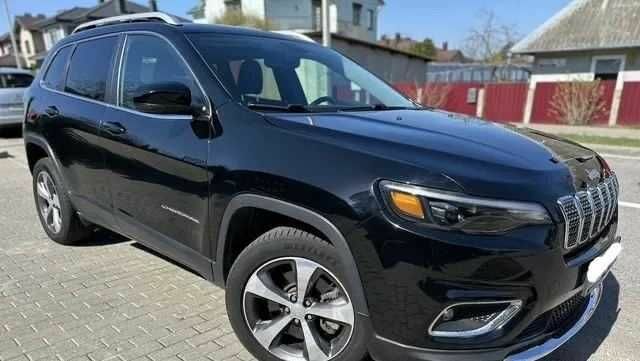 Чорний Джип Cherokee, об'ємом двигуна 2.4 л та пробігом 95 тис. км за 13000 $, фото 1 на Automoto.ua