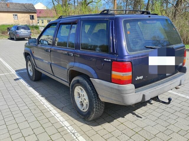 Фіолетовий Джип Cherokee, об'ємом двигуна 0.25 л та пробігом 130 тис. км за 10600 $, фото 7 на Automoto.ua