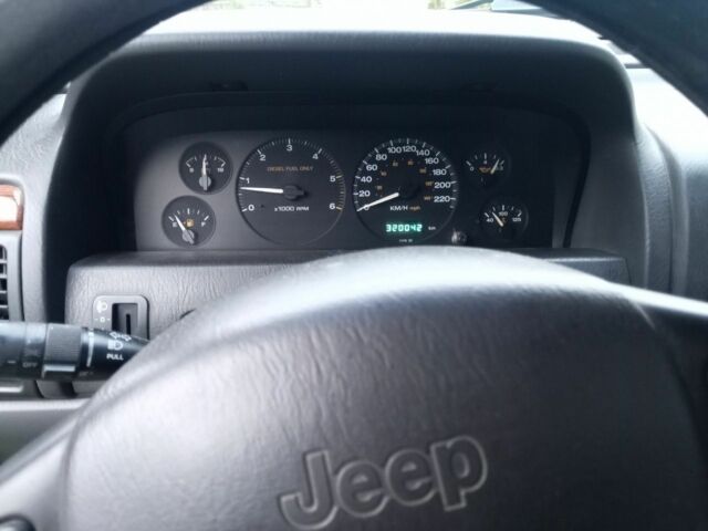 Фиолетовый Джип Чероки, объемом двигателя 3.1 л и пробегом 320 тыс. км за 6500 $, фото 4 на Automoto.ua