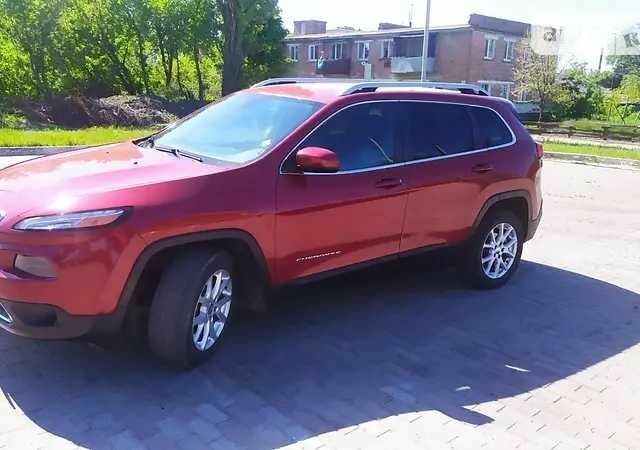 Червоний Джип Cherokee, об'ємом двигуна 2.4 л та пробігом 175 тис. км за 12800 $, фото 2 на Automoto.ua