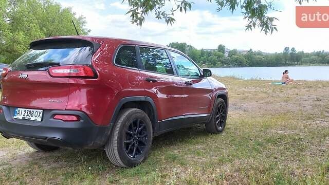 Червоний Джип Cherokee, об'ємом двигуна 2.36 л та пробігом 158 тис. км за 15000 $, фото 13 на Automoto.ua