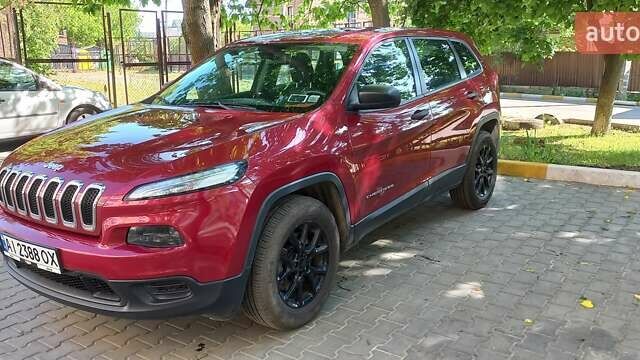 Червоний Джип Cherokee, об'ємом двигуна 2.36 л та пробігом 158 тис. км за 15000 $, фото 3 на Automoto.ua