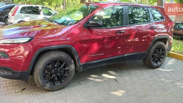 Червоний Джип Cherokee, об'ємом двигуна 2.36 л та пробігом 158 тис. км за 15000 $, фото 9 на Automoto.ua