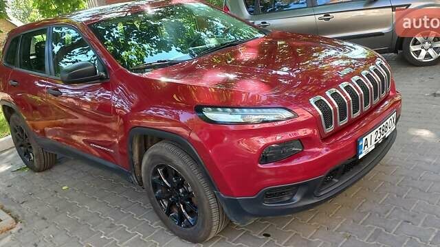 Червоний Джип Cherokee, об'ємом двигуна 2.36 л та пробігом 158 тис. км за 15000 $, фото 5 на Automoto.ua