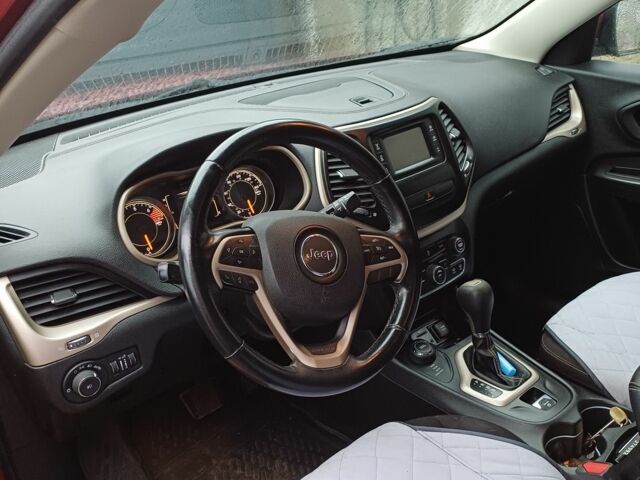 Червоний Джип Cherokee, об'ємом двигуна 2.4 л та пробігом 127 тис. км за 12000 $, фото 6 на Automoto.ua