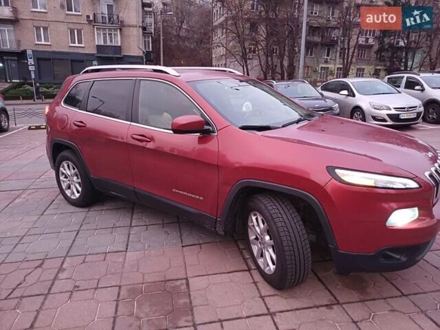 Красный Джип Чероки, объемом двигателя 2.4 л и пробегом 127 тыс. км за 12000 $, фото 1 на Automoto.ua