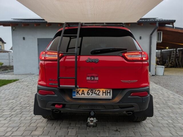 Красный Джип Чероки, объемом двигателя 3.2 л и пробегом 58 тыс. км за 23000 $, фото 4 на Automoto.ua