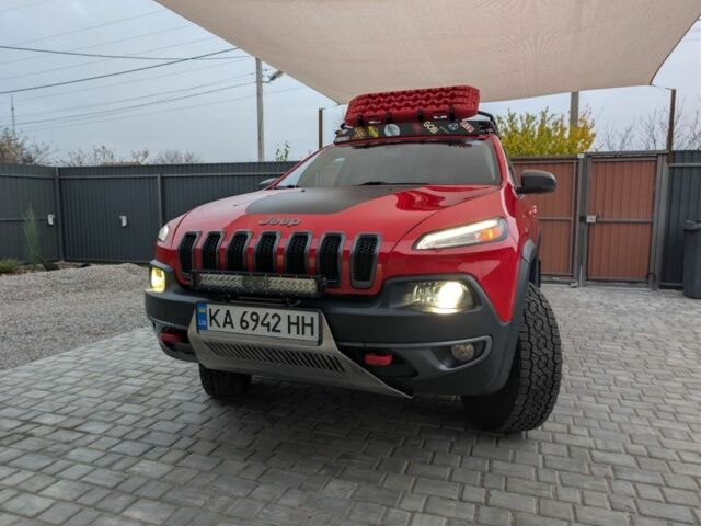 Красный Джип Чероки, объемом двигателя 3.2 л и пробегом 58 тыс. км за 23000 $, фото 1 на Automoto.ua