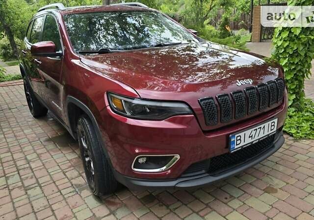 Червоний Джип Cherokee, об'ємом двигуна 3.24 л та пробігом 72 тис. км за 21900 $, фото 1 на Automoto.ua