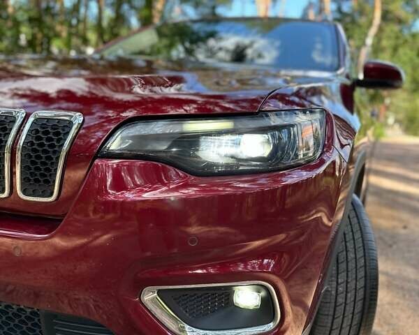 Червоний Джип Cherokee, об'ємом двигуна 2 л та пробігом 87 тис. км за 18300 $, фото 2 на Automoto.ua