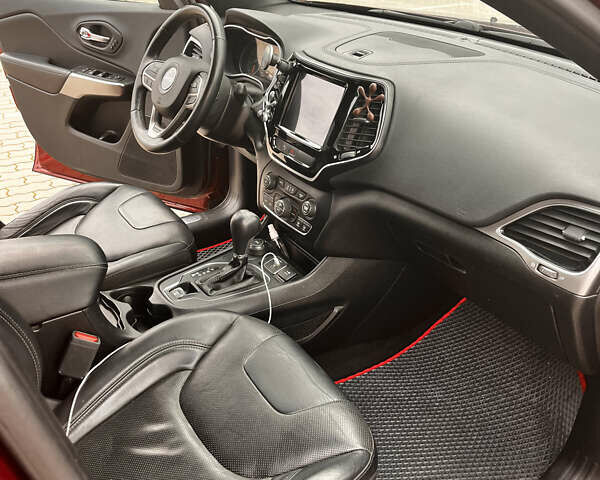 Красный Джип Чероки, объемом двигателя 2 л и пробегом 109 тыс. км за 19500 $, фото 20 на Automoto.ua