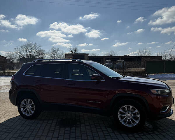 Червоний Джип Cherokee, об'ємом двигуна 2.36 л та пробігом 185 тис. км за 15600 $, фото 4 на Automoto.ua
