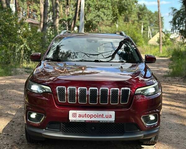 Червоний Джип Cherokee, об'ємом двигуна 2 л та пробігом 87 тис. км за 18300 $, фото 1 на Automoto.ua
