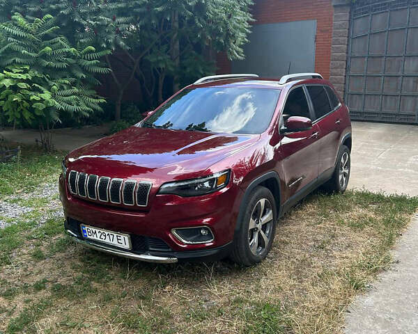Червоний Джип Cherokee, об'ємом двигуна 2.36 л та пробігом 129 тис. км за 16999 $, фото 2 на Automoto.ua