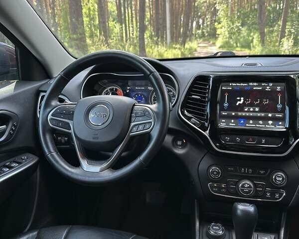 Червоний Джип Cherokee, об'ємом двигуна 2 л та пробігом 87 тис. км за 18300 $, фото 39 на Automoto.ua
