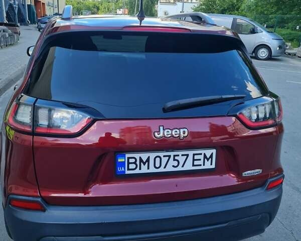 Красный Джип Чероки, объемом двигателя 2.36 л и пробегом 157 тыс. км за 15300 $, фото 1 на Automoto.ua