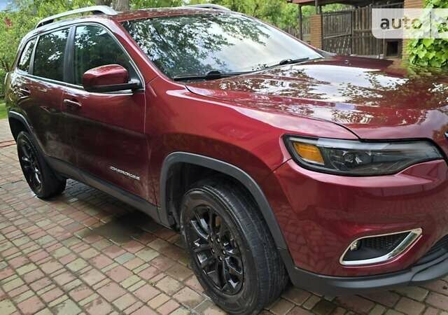 Червоний Джип Cherokee, об'ємом двигуна 3.24 л та пробігом 72 тис. км за 21900 $, фото 2 на Automoto.ua