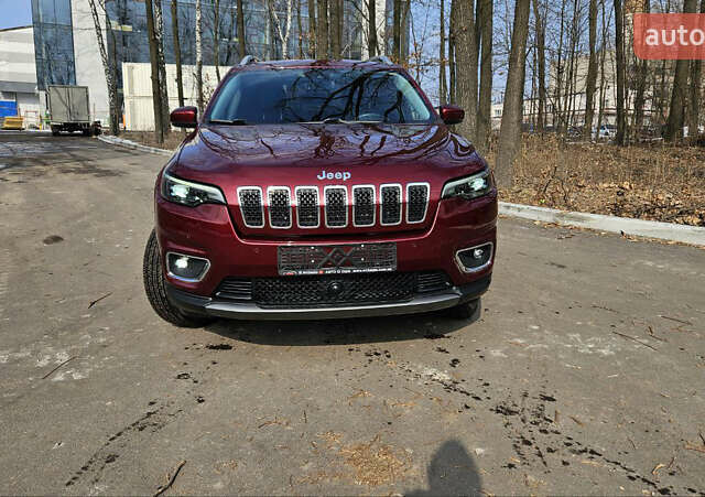 Красный Джип Чероки, объемом двигателя 2 л и пробегом 63 тыс. км за 17500 $, фото 2 на Automoto.ua