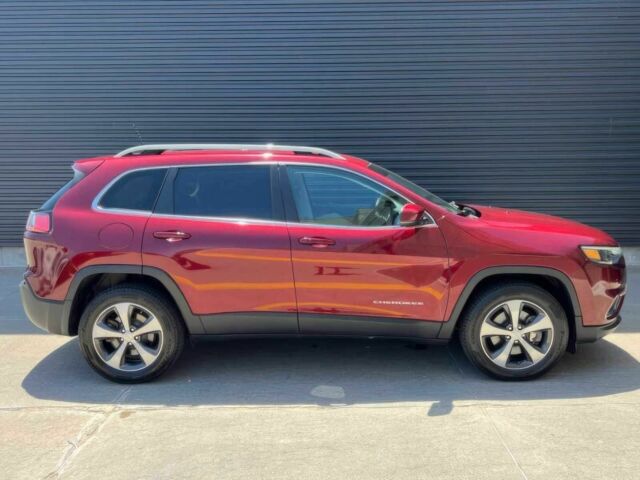 Червоний Джип Cherokee, об'ємом двигуна 3.2 л та пробігом 66 тис. км за 16400 $, фото 3 на Automoto.ua