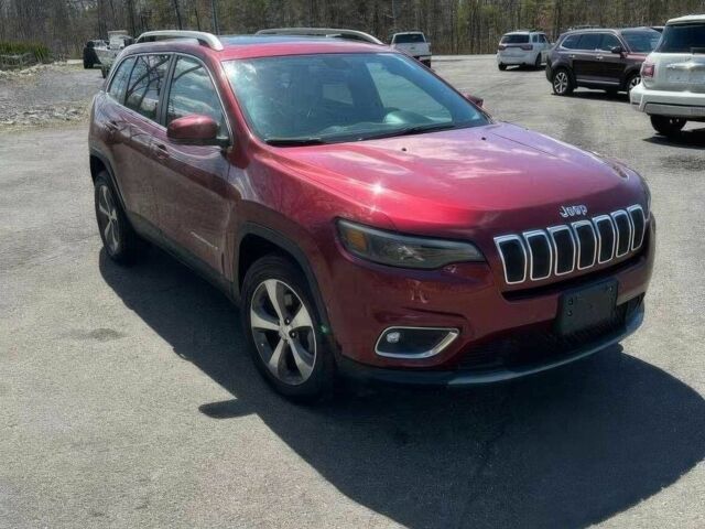 Красный Джип Чероки, объемом двигателя 3.2 л и пробегом 47 тыс. км за 17000 $, фото 2 на Automoto.ua