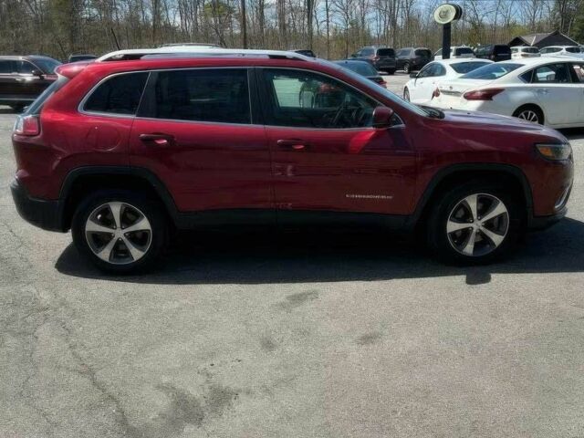 Красный Джип Чероки, объемом двигателя 3.2 л и пробегом 47 тыс. км за 17000 $, фото 3 на Automoto.ua