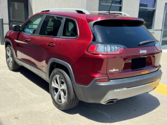 Червоний Джип Cherokee, об'ємом двигуна 3.2 л та пробігом 66 тис. км за 16400 $, фото 6 на Automoto.ua