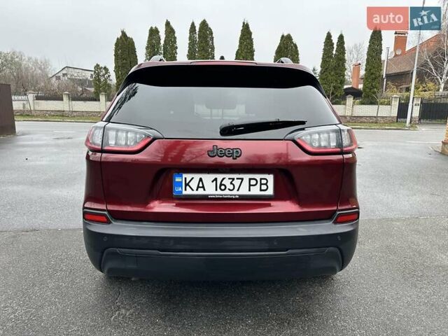 Красный Джип Чероки, объемом двигателя 2.36 л и пробегом 98 тыс. км за 16500 $, фото 3 на Automoto.ua