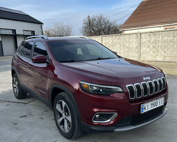 Червоний Джип Cherokee, об'ємом двигуна 3.24 л та пробігом 120 тис. км за 18100 $, фото 4 на Automoto.ua